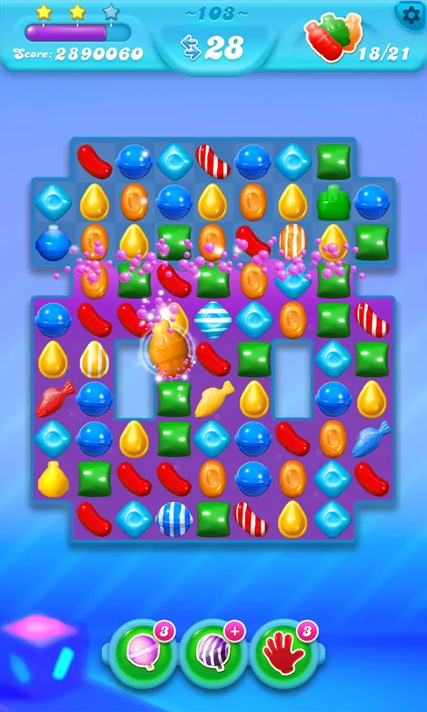 Candy Crush Soda Saga gameplay: a tall board of coloured sweets with the level goal counters along the top